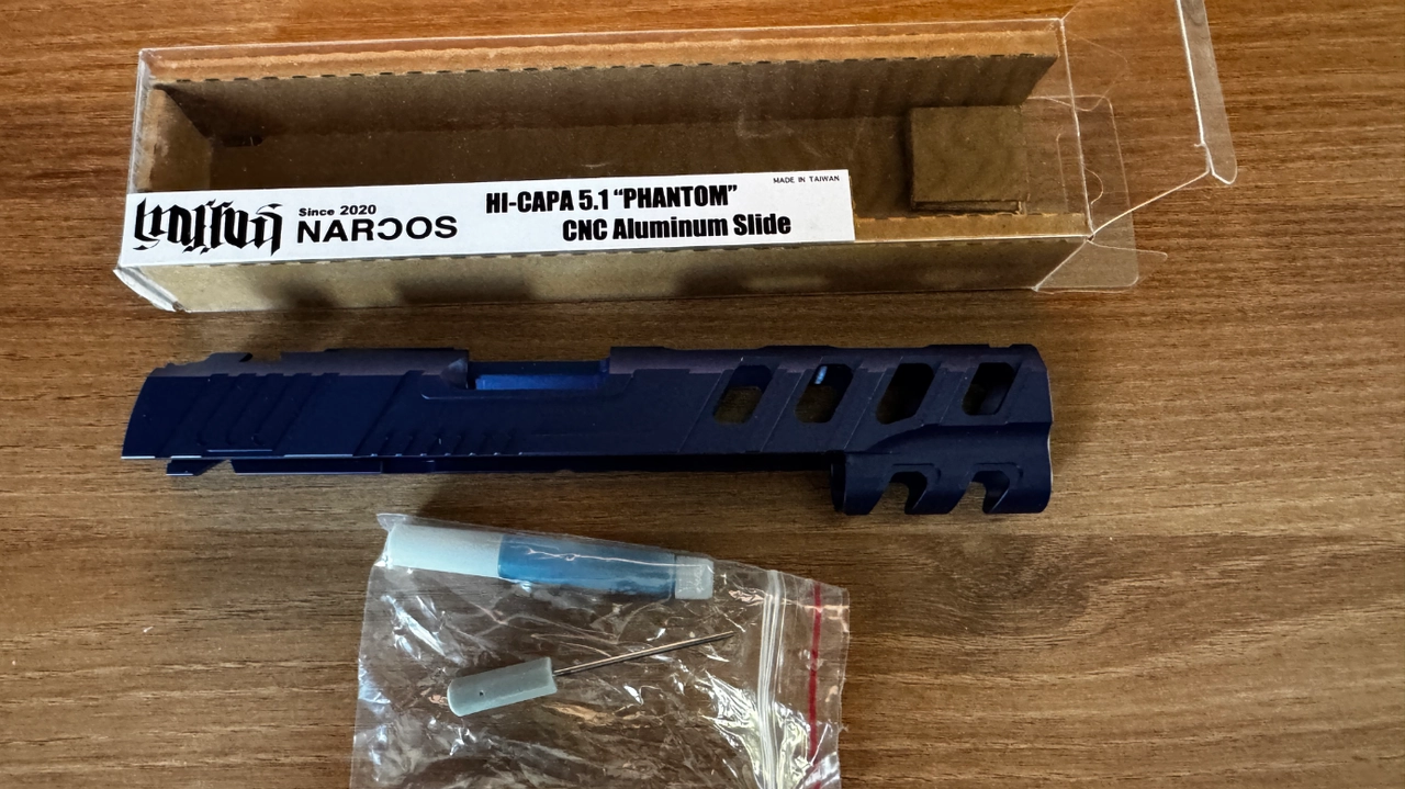 https://resize-it.airsoftmarket.fr/images/resize/scraped/v163jc234126c64/1745568045398-De-Poing-a-Gaz-Occitanie-Herault-Slide-Narcos-Hi-Capa-5-1-Phantom-Blue-575b8acf5a.webp
